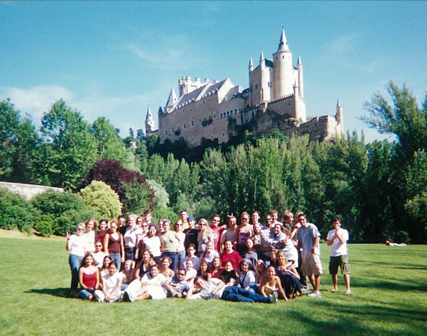 group in front of castle